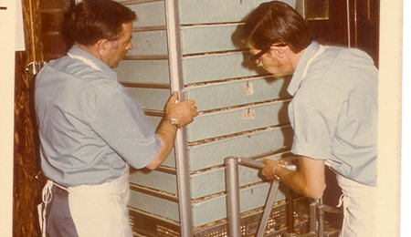 1960's egg loading men